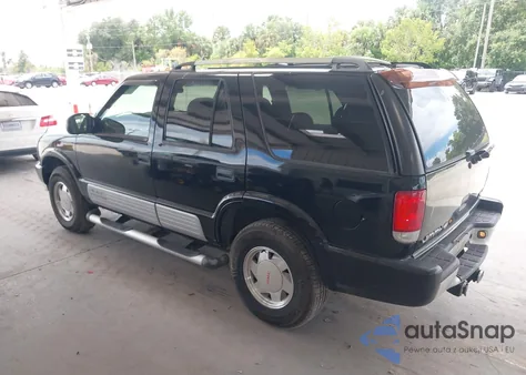 2001 GMC Jimmy Luxury из США, поврежденный, VIN 1GKCS63W812105518
